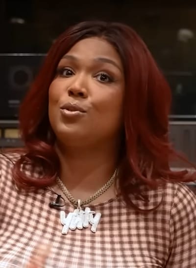 Lizzo performing at an awards show