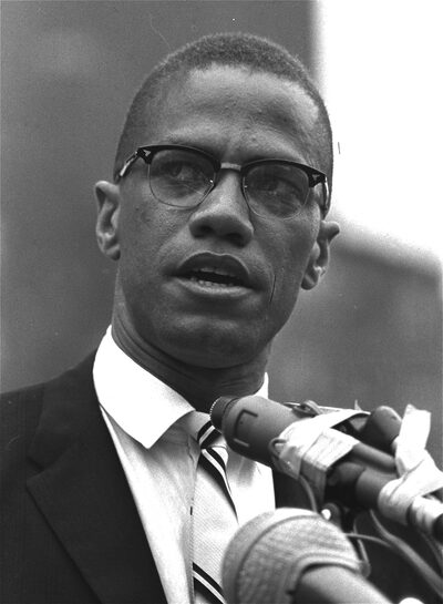 Malcolm X speaking at a rally