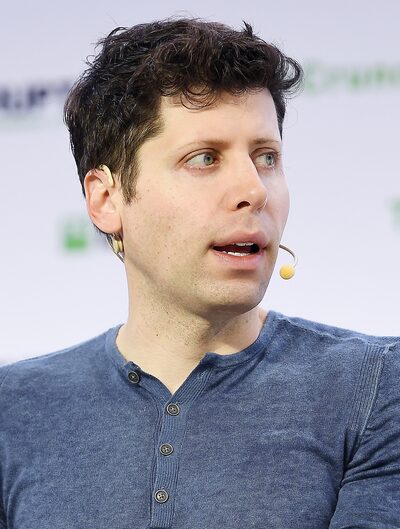 Sam Altman speaking at an AI conference