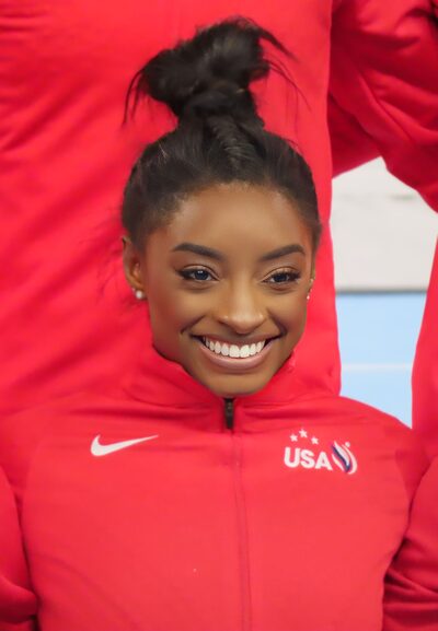 Simone Biles performing a gymnastics routine